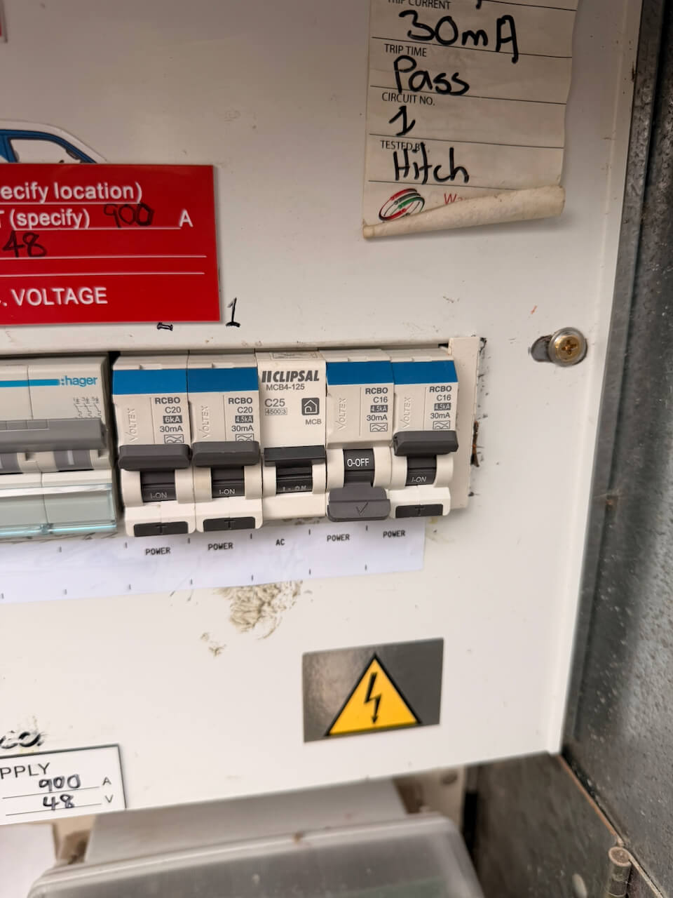 The tripped second-last switch (RCBO, shown at O-OFF) in the front door board